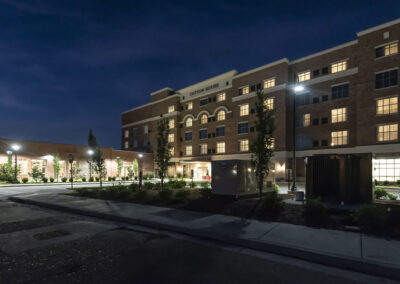 The Cotton House is lit up at night