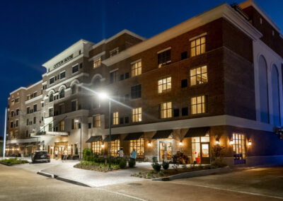 The Cotton House lit up at night, with lighting by Robinson Electric