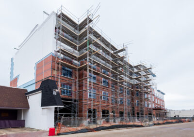 A large commercial construction site at Cotton House, with electrical work being done by Robinson Electric.