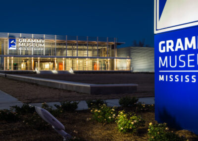 The Grammy Museum of Mississippi has a bright blue lit up sign created by Robinson Electric
