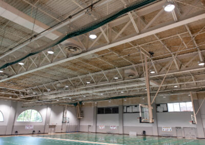 Lighting over an indoor pool by Robinson Electric at Delta State University's Kent Wyatt Gym
