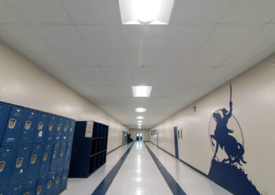 Lighting in the bright hallways of Kirk Academy by Robinson Electric
