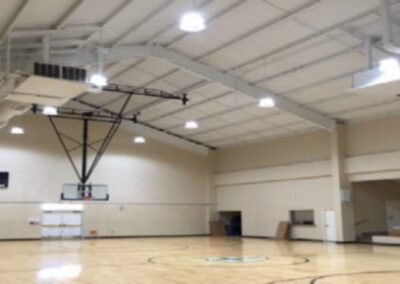 A well lit basketball gym