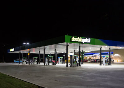 DoubleQuick gas station is lit up at night by Robinson Electric