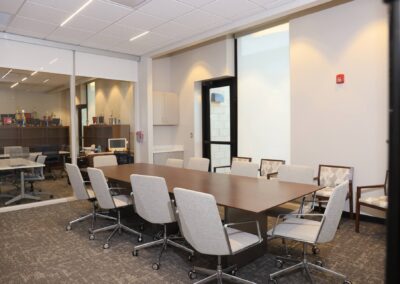An interior image of a conference room at Bayou Academy, with electrical work done by Robinson Electric.