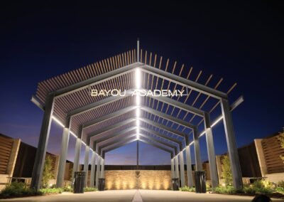 The Bayou Academy pavilion is lit up beautifully at night, with electrical work done by Robinson Electric.