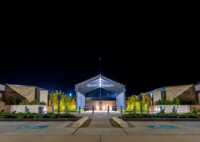 Bayou Academy lit up at night