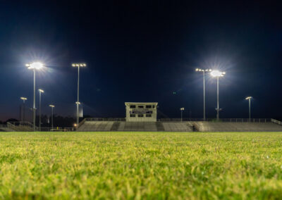 Cleveland Central ball fields from ground view, showing the stands and large lights